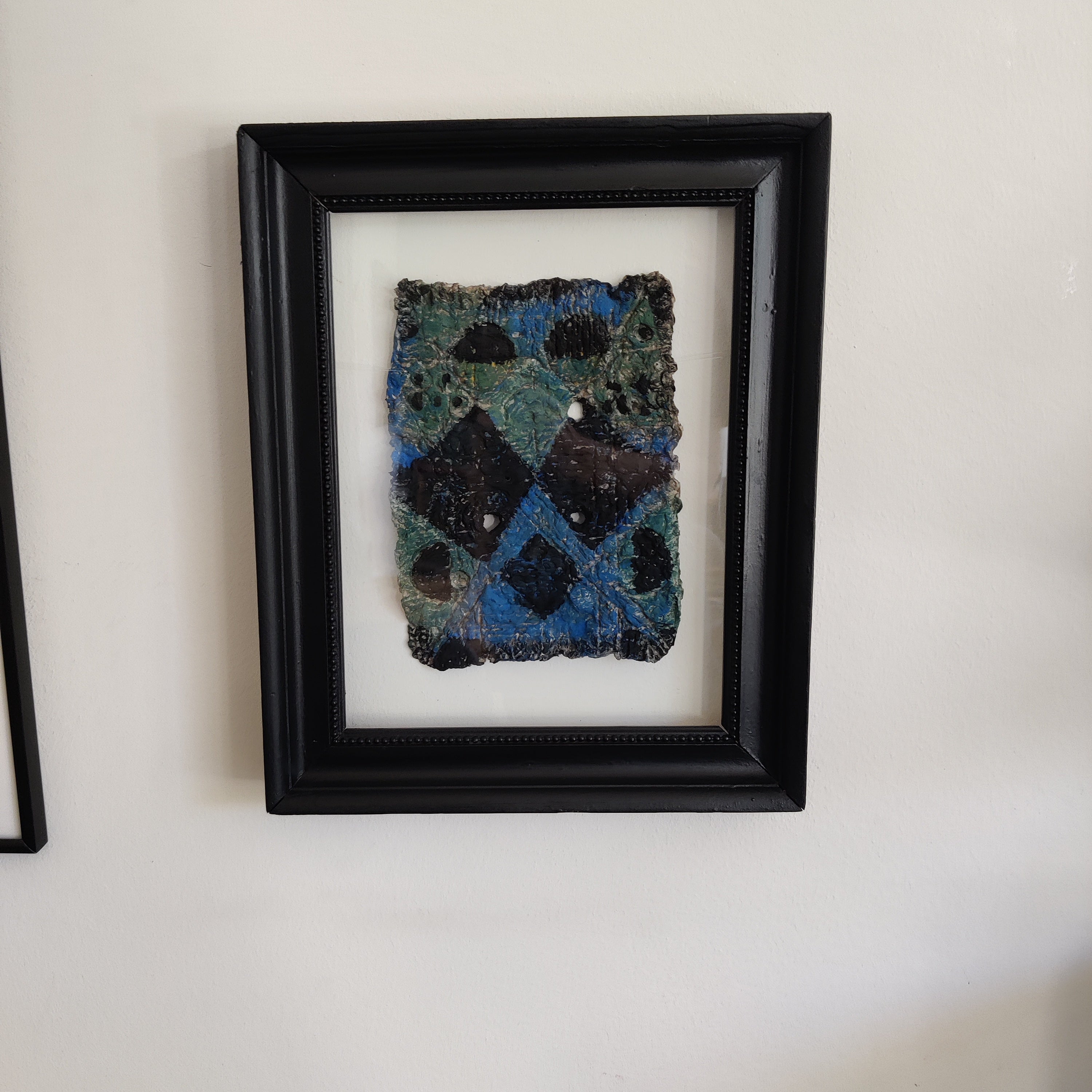 The paper pulp floating cloth framed artwork using pulped paper