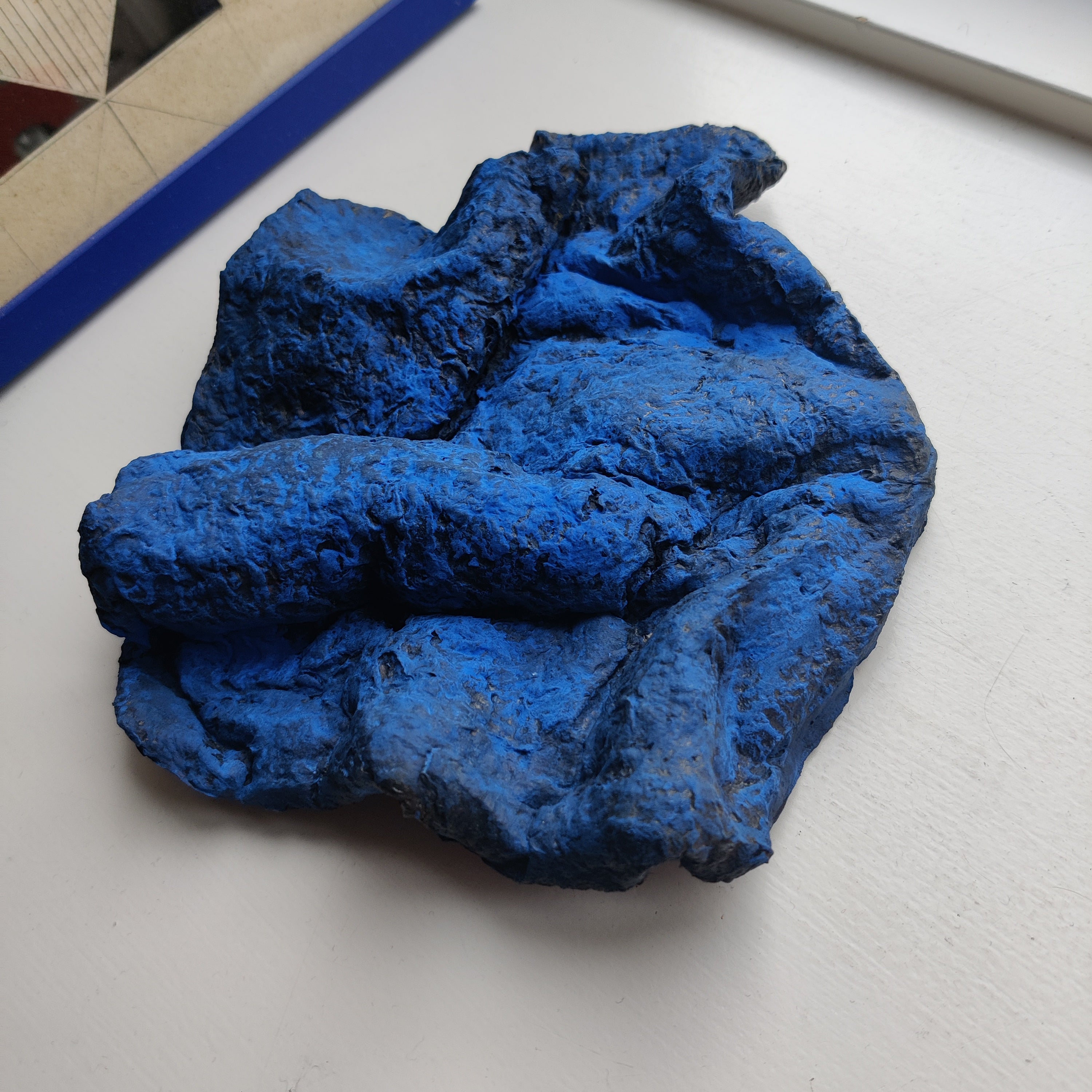 Volcano Part artwork, an example of organic relief texture similar to thick newspaper paper mache layers