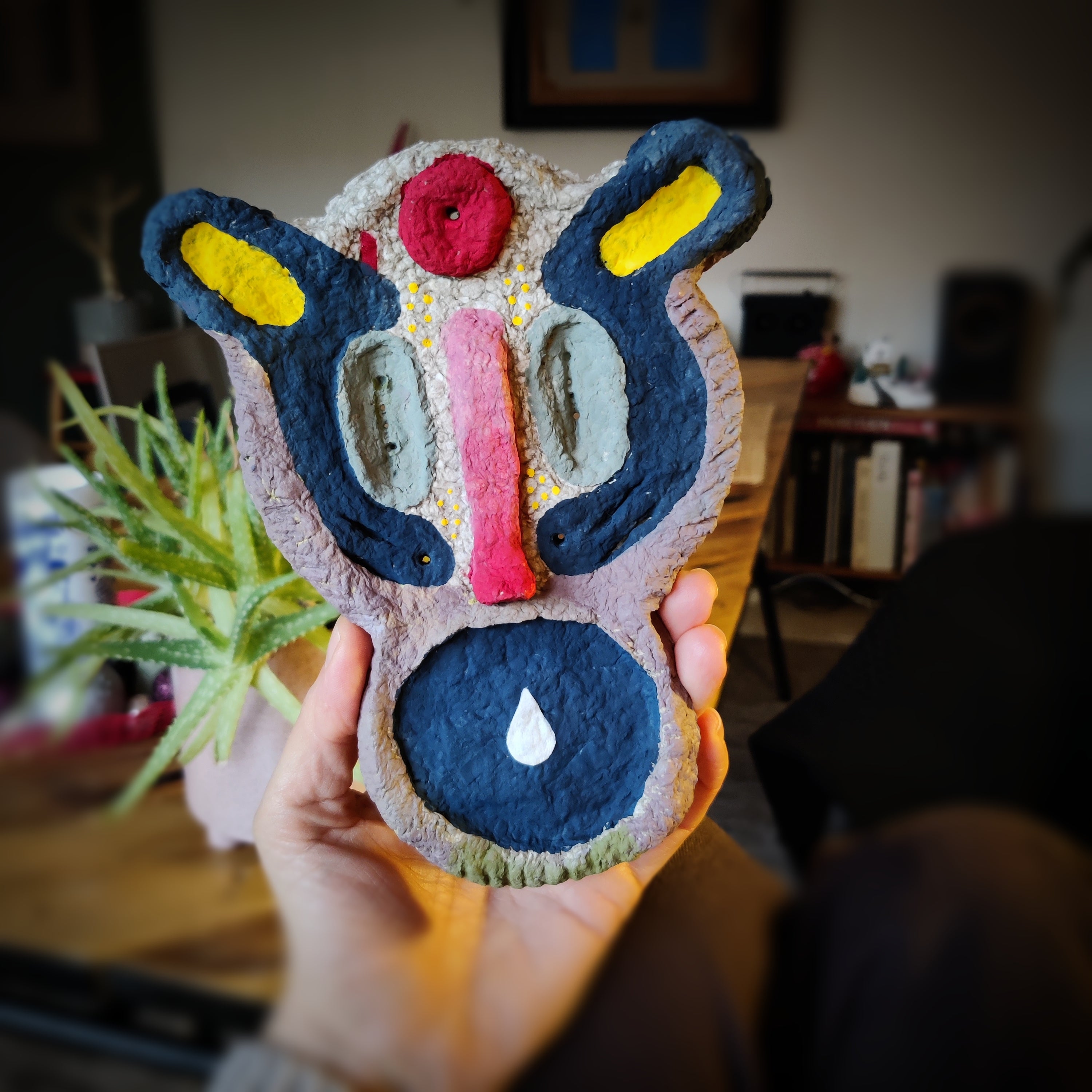 Colorful Paper Pulp Creature, showing how pulp and paint can grow from simple newspaper-based experiments